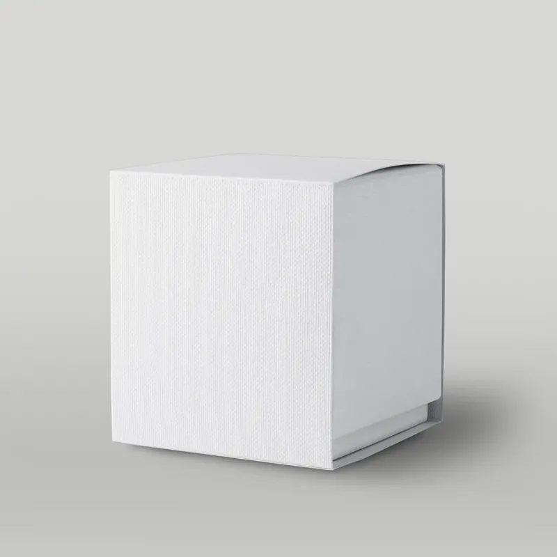 White textured candle box on a light grey background