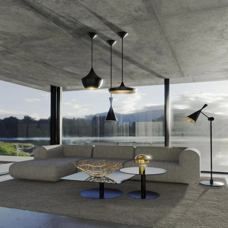 Tom Dixon Beat Tall LED Hängelampe Ø 19cm in modernem Wohnzimmer mit eleganter Einrichtung.