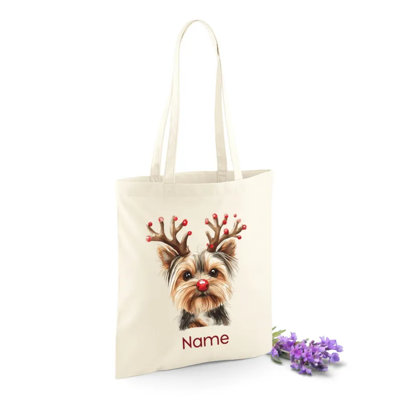 Beige Tragetasche mit Yorkshire Terrier und Weihnachtsdeko.