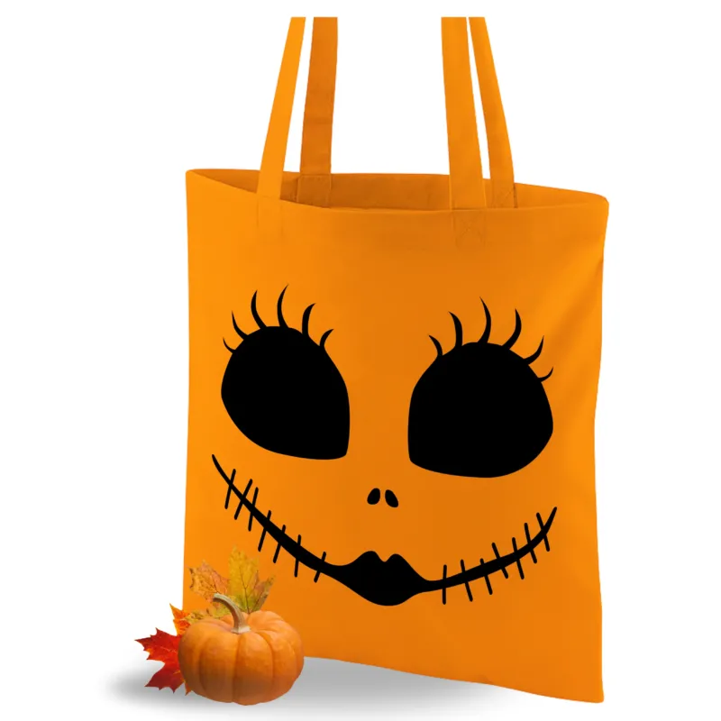 Orangene Tragetasche mit schwarzem Totenkopf-Gesicht.