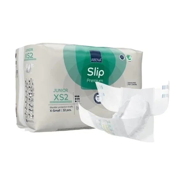 Abena Slip Premium Junior XS2 in einer packenden Ansicht. Die Windel ist überwiegend weiß mit bunten Grafiken, die freundliche Designs von Tieren und bunten Formen zeigen, was sie besonders ansprechend für Kinder macht. Die Windel hat elastische Bündchen für eine optimale Passform und bietet hohen Tragekomfort. Im Bild sind die seitlichen Klettverschlüsse sichtbar, die eine sichere Anpassung gewährleisten.