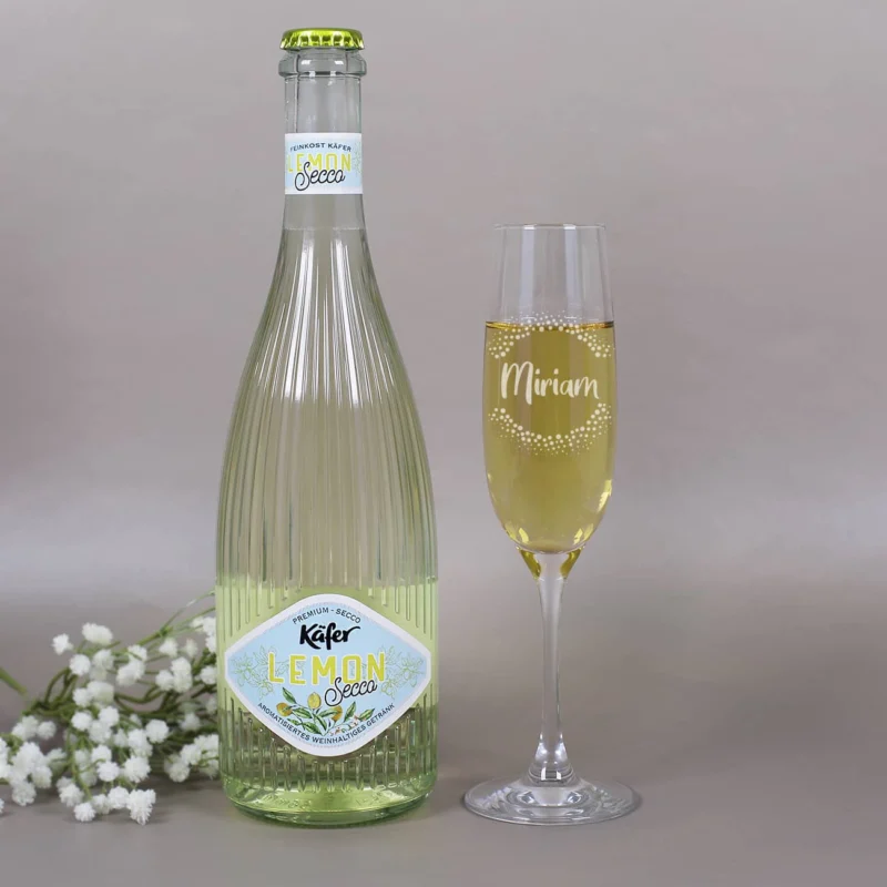 Lemon Secco von Käfer und Sektglas mit Namensgravur