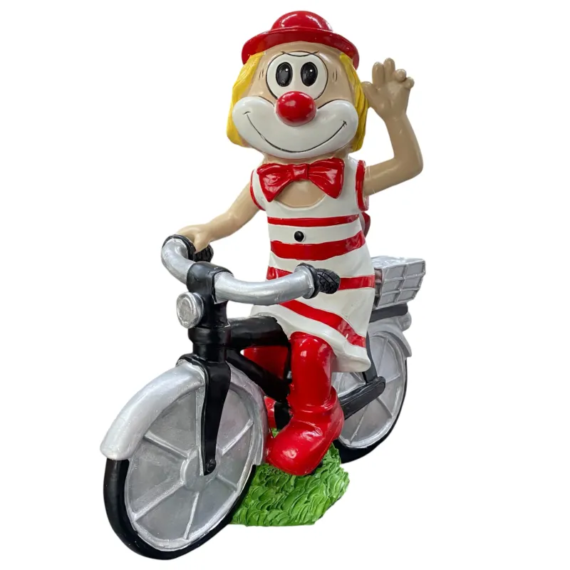 Große Schmitzens Clown auf Fahrrad vor weißem Hintergrund